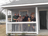 Two Smithville families get keys to new state-financed homes